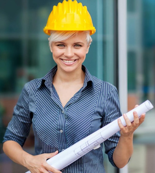 Woman in labor uniform holding a project paper